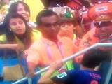  World Cup 2014: Robin van Persie appears to give his bronze medal to eccentric Netherlands fan moments after being handed it by 