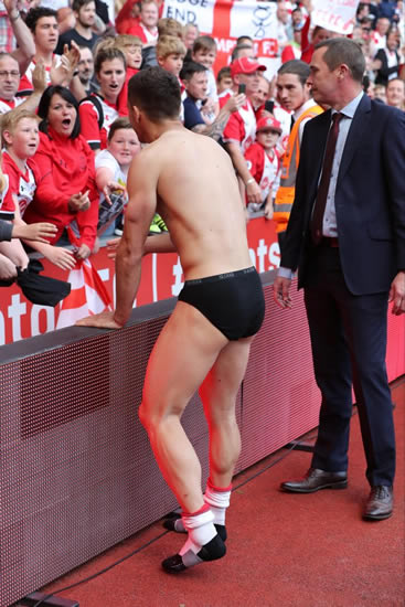 Southampton star Dusan Tadic celebrates survival with kit giveaway… and ends up in just his pants