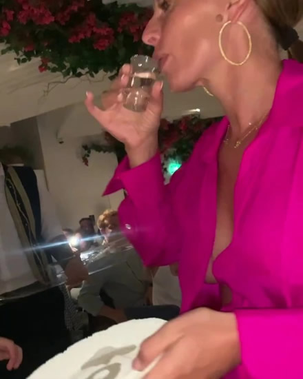 ROO TOO MANY? Wayne Rooney cuts head while Coleen does shots as things get a bit meze on wild night out at Greek restaurant in Dubai