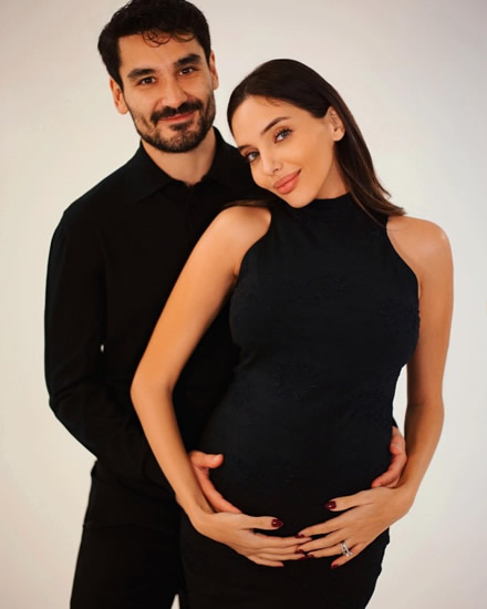 TOP GUN Man City star Ilkay Gundogan and model wife announce they are having a baby as they cradle her growing bump