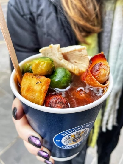 CUP OF CHEER Footie fans left drooling as Stockport County offers supporters Christmas dinner in a CUP for £4.50