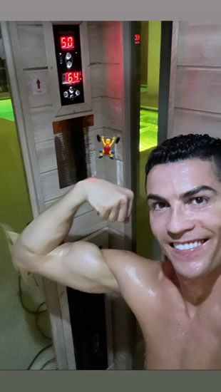 Cristiano Ronaldo looks happy as he gives his fans tickets to his gun show