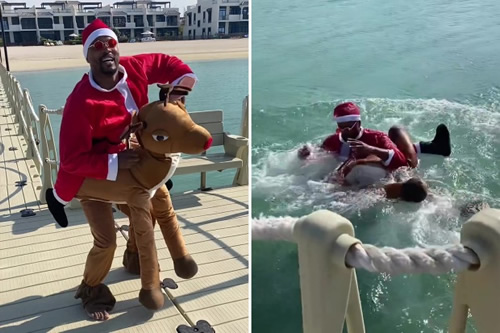 Fans love Patrice Evra’s ‘absolutely berserk’ Christmas video as he dresses as Santa, rides Rudolph and goes for a swim