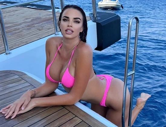 KEEPING KNOLL World Cup’s ‘hottest fan’ Ivana Knoll squeezes into tiny pink bikini as she relaxes after taking tournament by storm