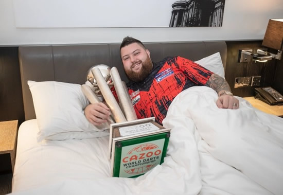 TOP OF THE WORLD Moment World Darts Champion Michael Smith brilliantly recreates iconic Lionel Messi World Cup bed pic with PDC trophy