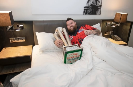 TOP OF THE WORLD Moment World Darts Champion Michael Smith brilliantly recreates iconic Lionel Messi World Cup bed pic with PDC trophy