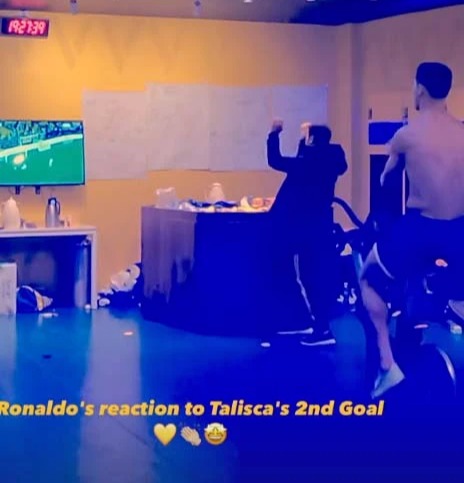 WATCHING RON Cristiano Ronaldo cheers Al-Nassr goal as banned star watches first game since transfer topless on exercise bike