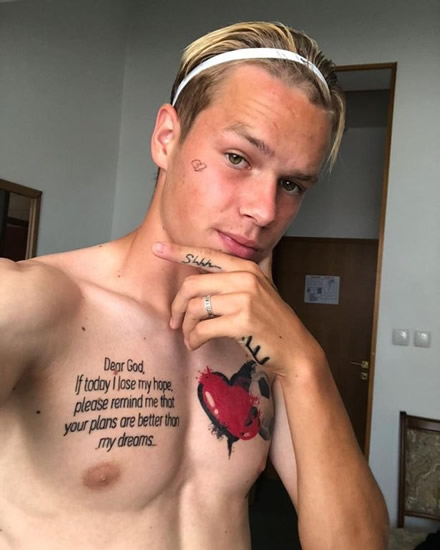 Chelsea star Mykhaylo Mudryk loves tattoos - and even has football ink on his chest