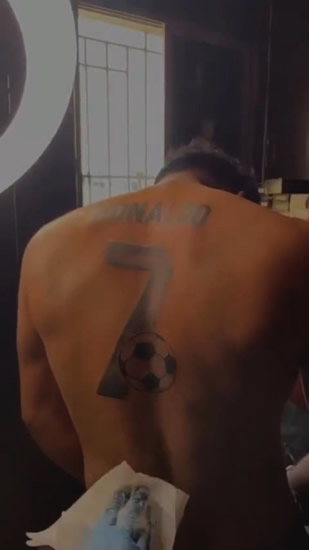 TATT'S IT I love Cristiano Ronaldo so much I got his name and number tattooed on my back and cried at his World Cup exit