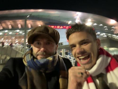 ‘Sleep tight dad’ – Gloating Romeo Beckham gets one over glum David as he shows off Arsenal scarf after Man Utd win