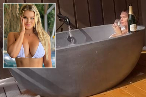 Champions League streaker Kinsey Wolanski sends fans wild as she sips champagne in the bath after joining OnlyFans