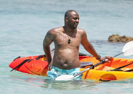 PAT'S GOOD Arsenal legend Patrick Vieira shows off belly tattoo as he relaxes in Barbados amid talk of return to Premier League