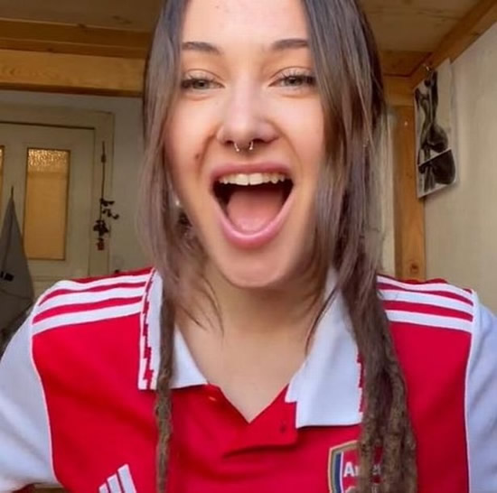 Arsenal fan who loves showing off assets while wearing full kit lifts up shirt in joy