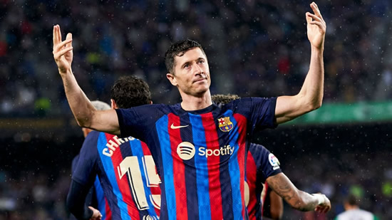 Barcelona edge closer to title with 4-0 win over 10-man Betis