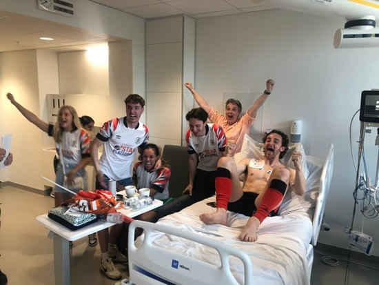LOCK UP Tom Lockyer celebrates Luton promotion wildly from hospital bed after scary on-pitch collapse as dad gives health update