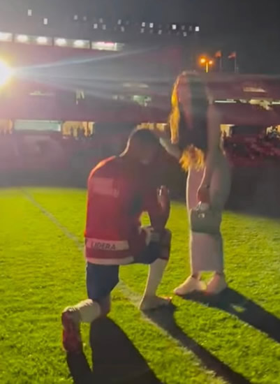 Footballer proposes to stunning WAG on the pitch after bagging promotion to La Liga