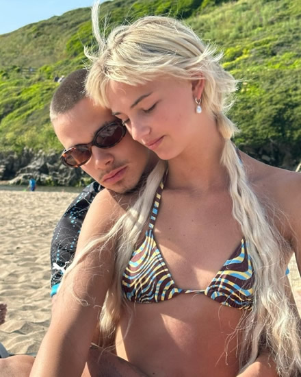 SO RO-MANTIC Romeo Beckham’s girlfriend Mia Regan stuns in tiny bikini as he cuddles her from behind after engagement rumours