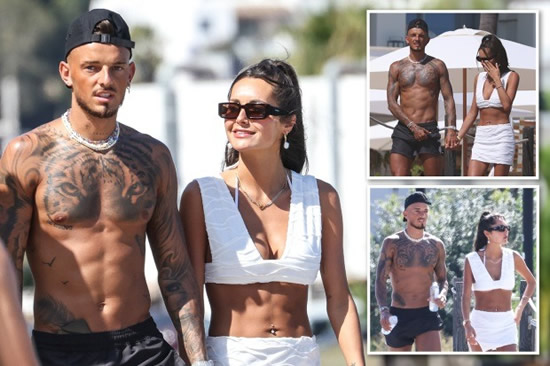 Arsenal ace Ben White and wife Milly Adams walk hand in hand as they enjoy romantic honeymoon in Ibiza