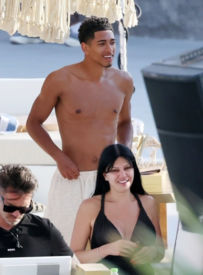 BELLI OUT Topless Jude Bellingham relaxes at trendy beach club in Mykonos ahead of £115m Real Madrid transfer
