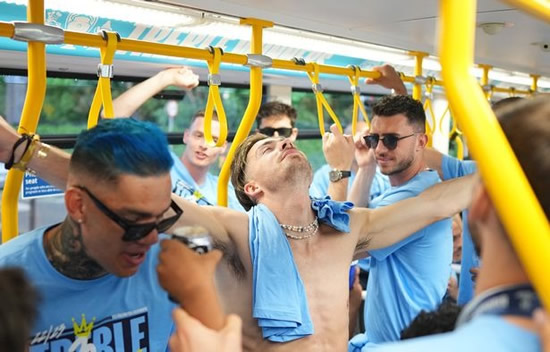 Topless Jack Grealish can't stop smiling as Man City star celebrates on tram