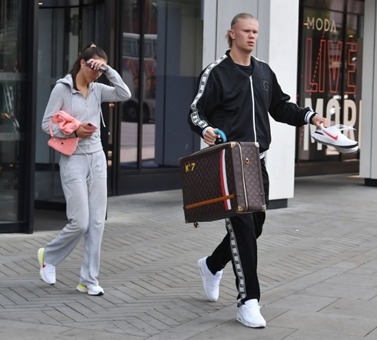 Erling Haaland looks worse for wear as he and stunning Wag leave Manchester apartment after boozy Treble celebrations