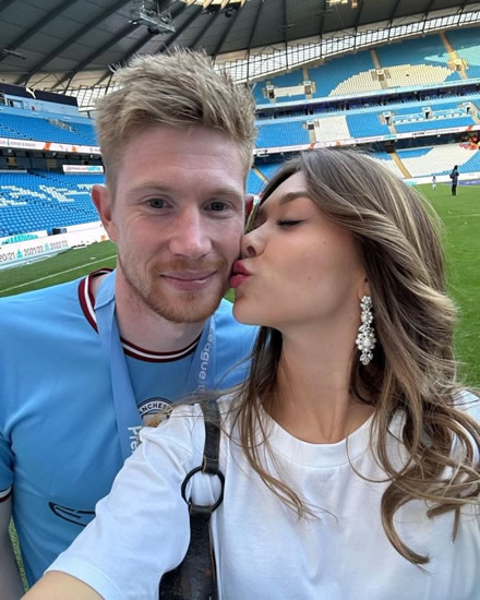 SHE'S DE ONE Kevin de Bruyne gets a kiss from stunning Wag as Man City legend and ‘best player in the world’ enjoys summer break