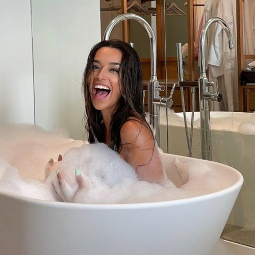 Premier League ace's gorgeous WAG teases fans with cheeky naked bathtub snap