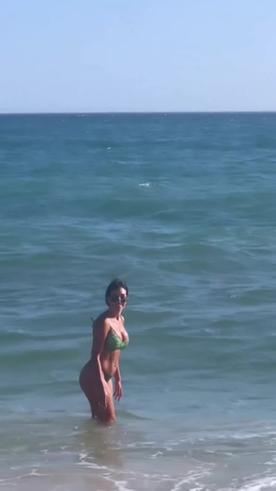 GEOR DROPPED Georgina Rodriguez shows off incredible beach body in bikini before she’s wiped out by huge wave