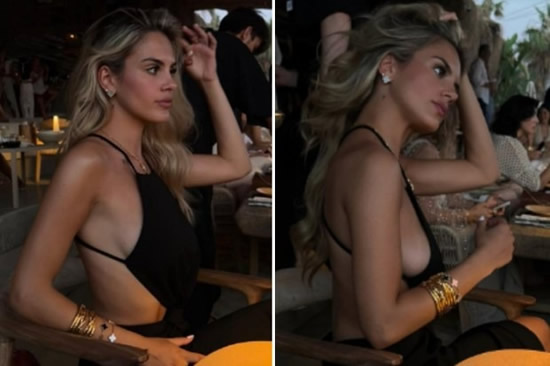 Premier League manager's model daughter joins no bra club and shows off major sideboob in revealing dress