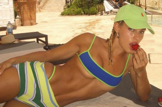 Ex-Barcelona WAG goes topless on beach and posts close-up of 'dangerous bikini'