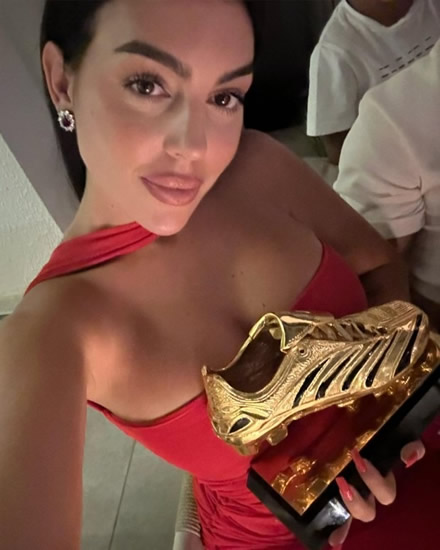 BRAVO Georgina Rodriguez stuns as she joins no bra club in glam red dress to hold Cristiano Ronaldo’s first Al-Nassr trophy