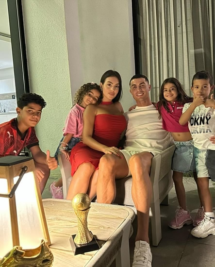 BRAVO Georgina Rodriguez stuns as she joins no bra club in glam red dress to hold Cristiano Ronaldo’s first Al-Nassr trophy