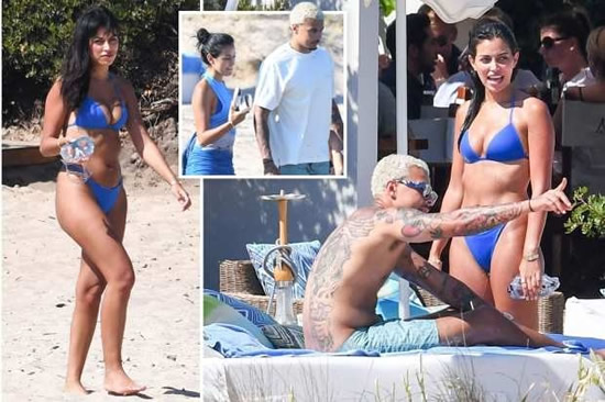Everton star Dele Alli looks loved up with girlfriend Cindy Kimberly as they soak up the sun on break in Italy