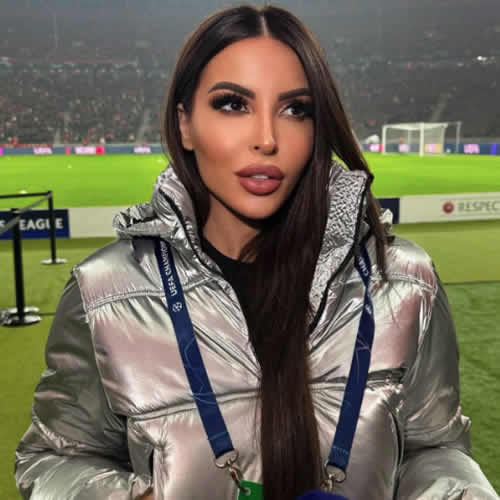 Glamorous football presenter and Kim Kardashian lookalike wows in bold outfit for Champions League clash