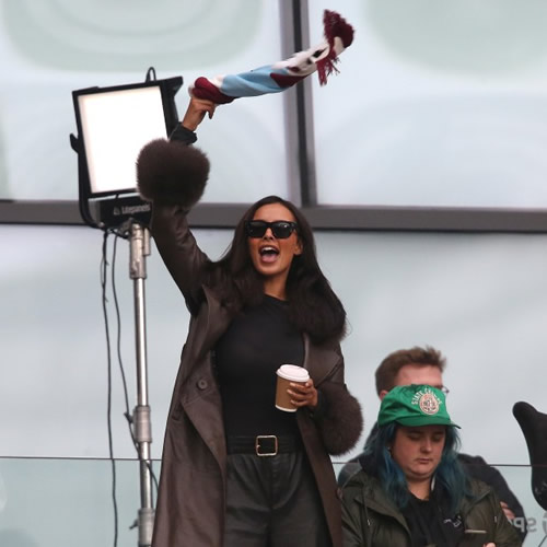 HAMMER TIME Glam TV star Maya Jama gets excited in stands and waves scarf above her head as she cheers West Ham to Man Utd triumph