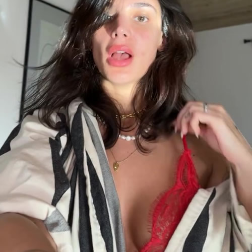 BEING FRANK Former Chelsea star’s glam daughter cheekily exposes cleavage in racy red lingerie in risque video