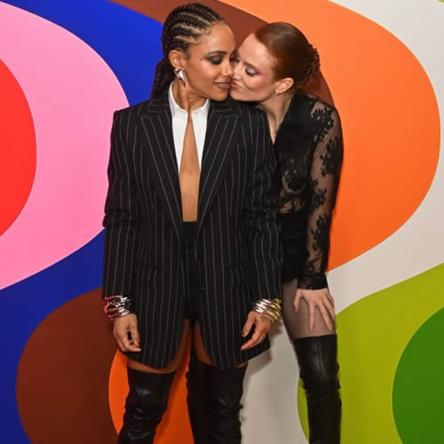 CUTE COUPLE Alex Scott and Jess Glynne look all loved up as they share a kiss and cuddle at Universal Music party