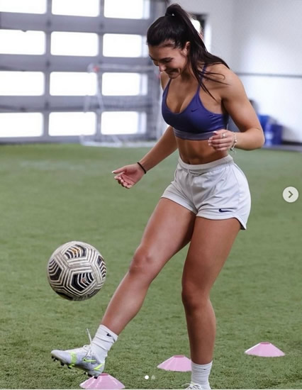 Stunning footballer-turned-WWE superstar makes in-ring debut and uses footy inspired move
