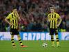 Lewandowski and Reus look like they‘ve had the stuffing knocked out of them as they wait to restart