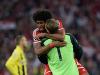 Dante and Neuer embrace on the final whistle
